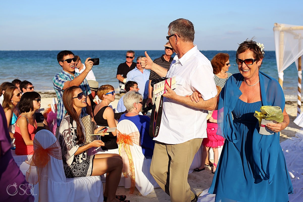 Guests on the beach at a wedding in Mexico