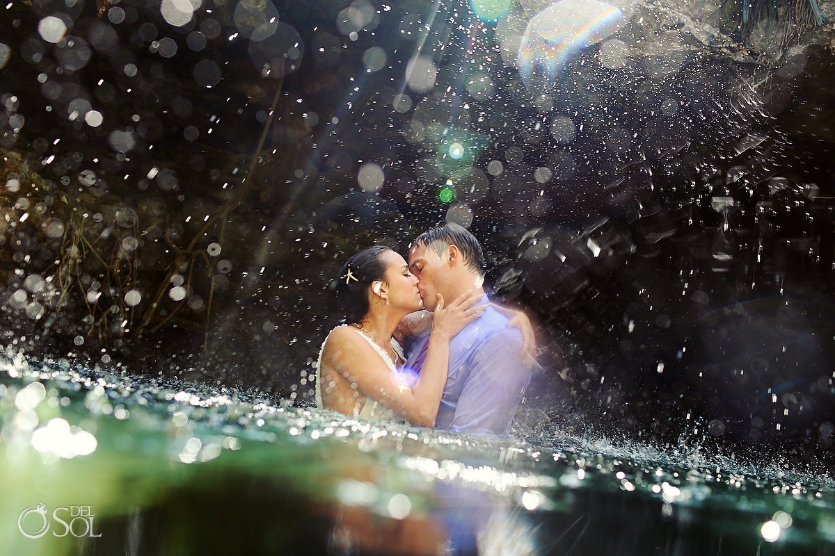 Cenote trash the dress splash bride and groom underwater