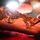 Applying mehndi on hands Hindu Indian Wedding Riviera Maya Iberostar Mexico