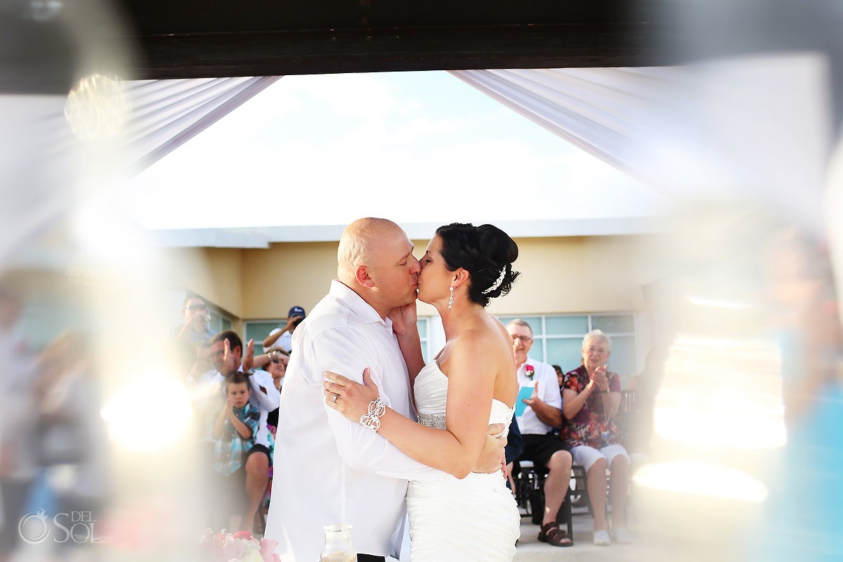 destination wedding photograph of First kiss at Now Jade hotel
