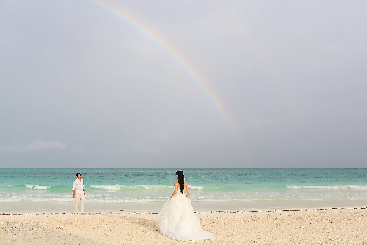 bride and groom under rainbow at Secrets Maroma destination riviera maya wedding secrets maroma