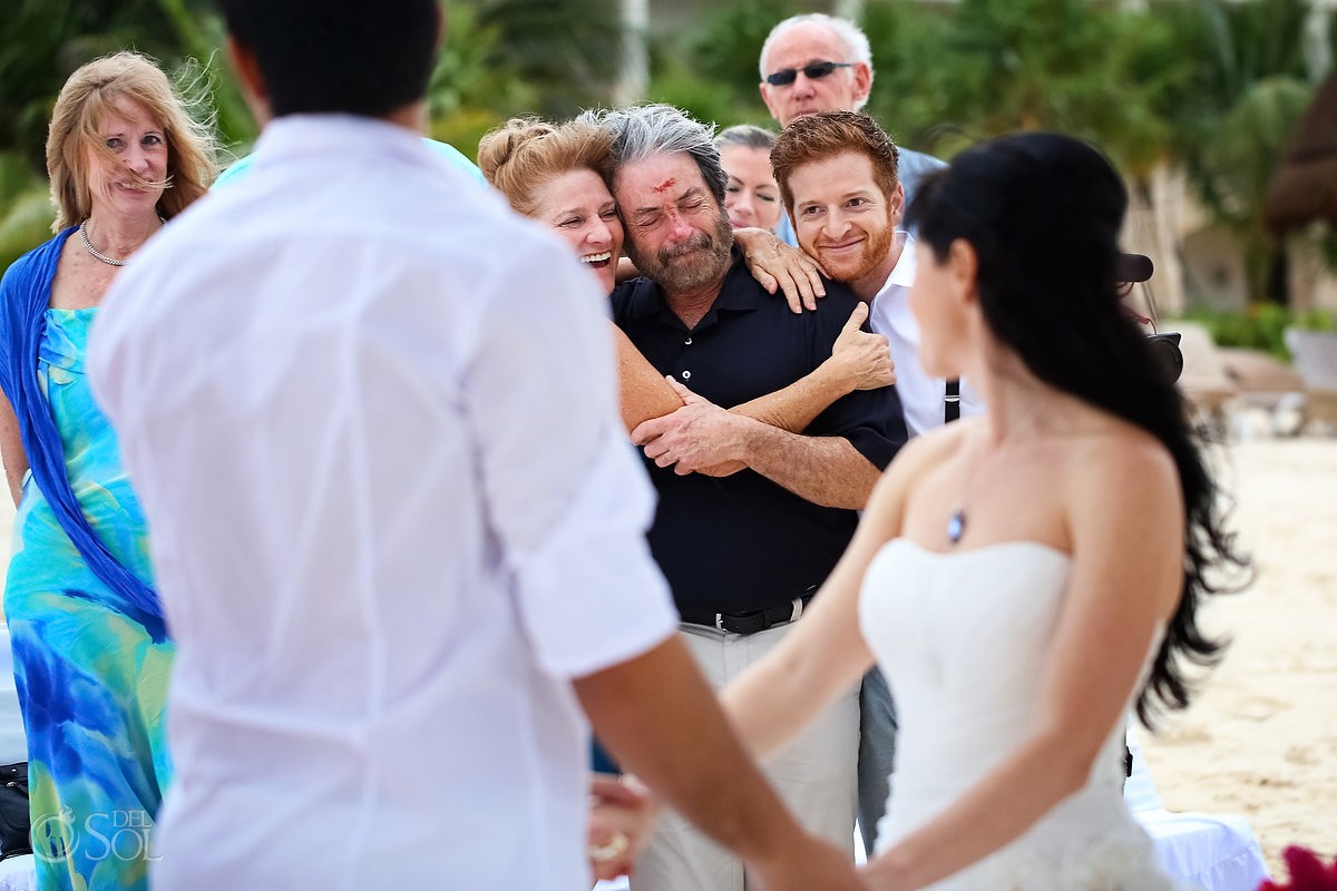 riviera maya wedding guests watching a beach ceremony