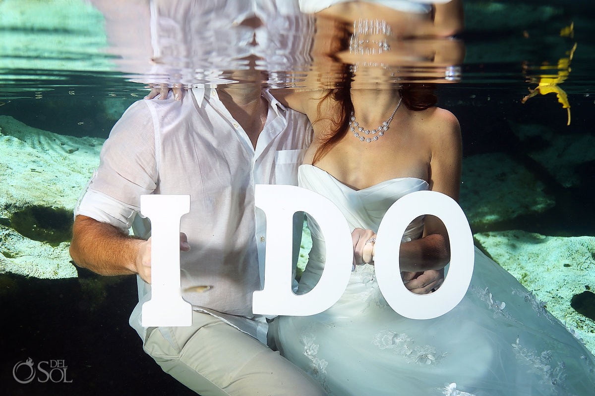 underwater bride and groom with and 