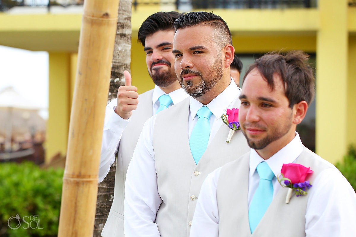 Groomsmen with a thumbs up at Ocean Coral and Turquesa, Puerto Morelos