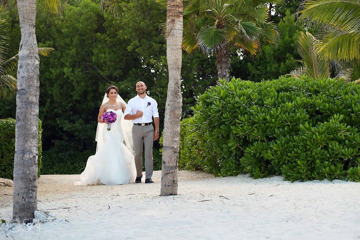 Bride groom beach wedding entrance together, Playa del Carmen, Mexico