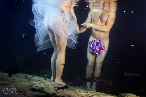 naked bride and groom with bouquet between legs, underwater boudoir sexy trash the dress