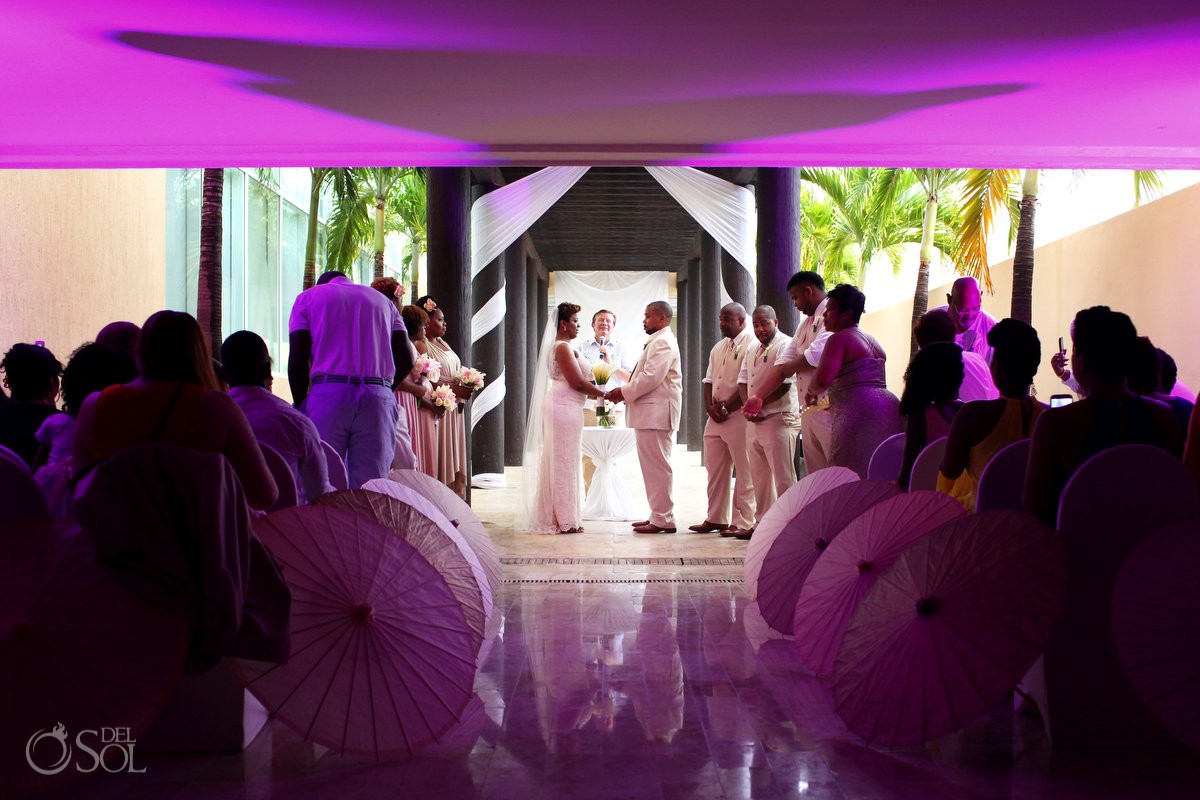 Black African American chocolate wedding ceremony pink light inside rain Now Jade Riviera Maya Mexico
