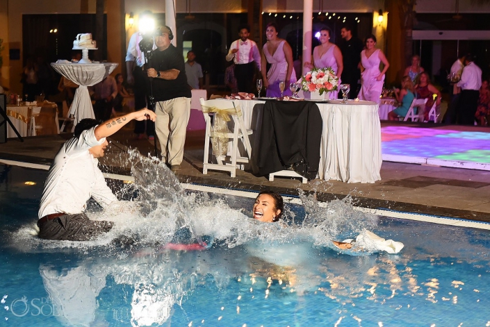 bride groom jumping swimming pool splash, Wedding Reception, El patio terrace, Dreams Sands Cancun, mexico