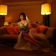 Bride portrait sofa room warm ambient light, Wedding Hacienda Uayamon, Campeche, Mexico