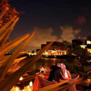 romantic wedding dinner bride groom kiss Elopement NIZUC Resort, Cancun, Mexico.