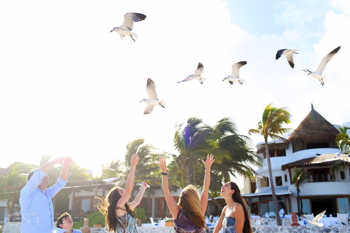 birds seagulls flying above family arms up, Portraits Belmond Maroma, Playa del Carmen, Mexico