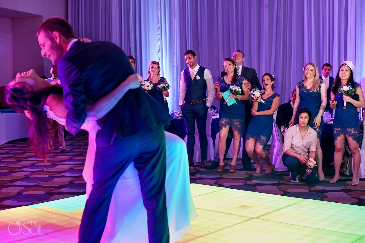 first dance, groom dip bride, smiling guests, wedding reception Live Aqua Cancun, Mexico