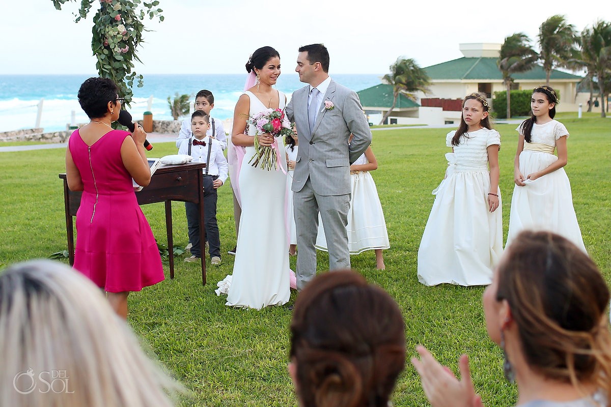 couple share smile, garden Wedding Iberostar Cancun, Mexico