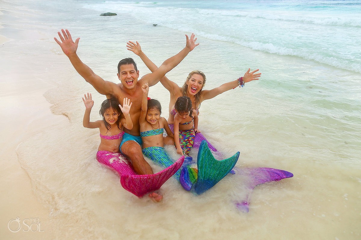 mermaid family portrait in the ocean