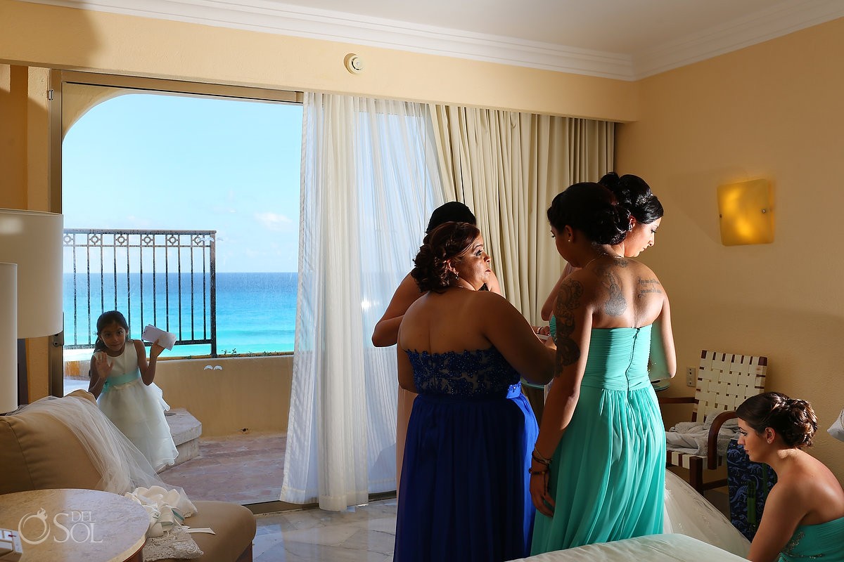 Bride getting ready flower girl looking through window, Wedding Fiesta Americana Condesa, Cancun, Mexico