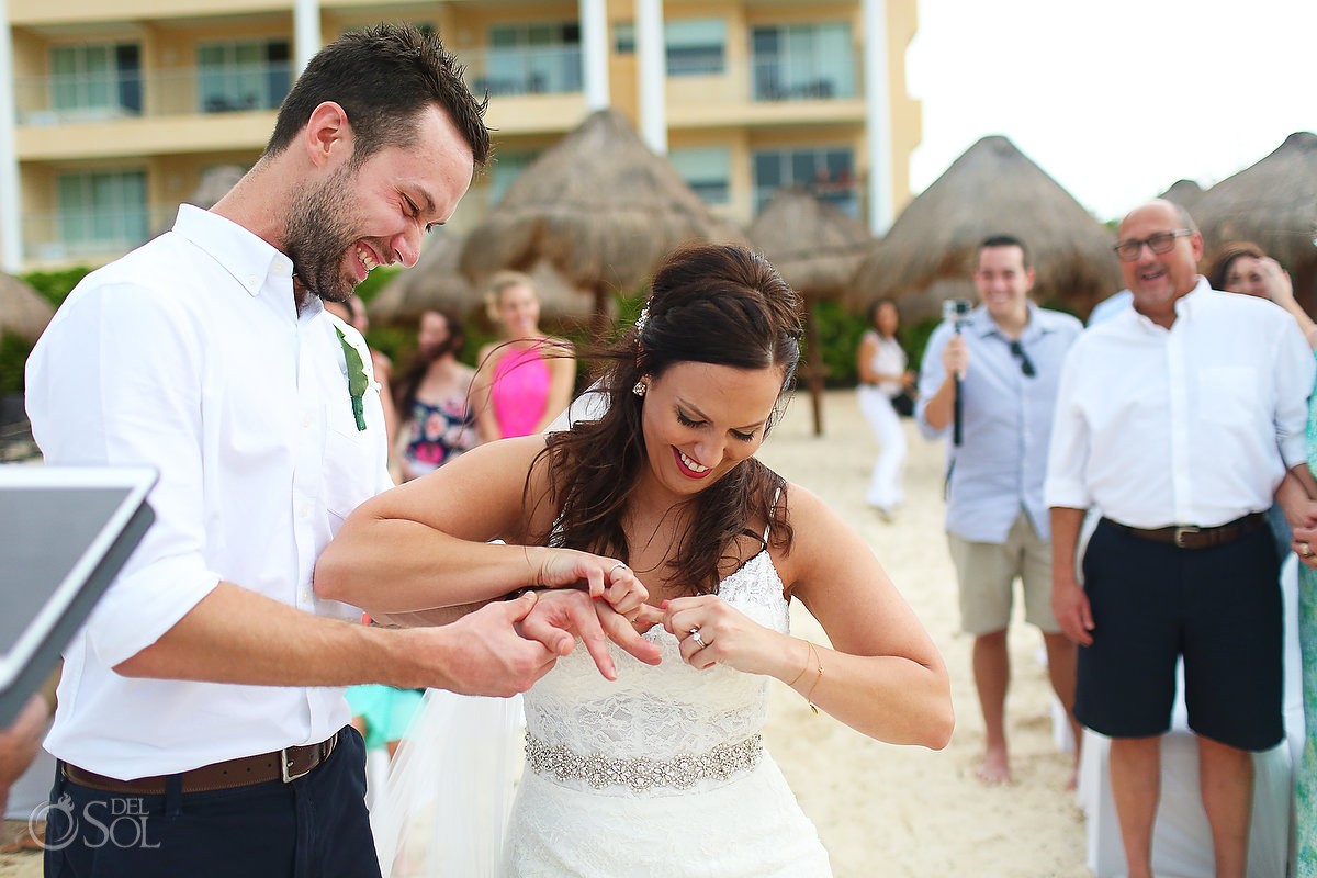 funny wedding picture bride pretends force ring grooms finger, Beach Wedding Now Jade, Puerto Morelos, Mexico.
