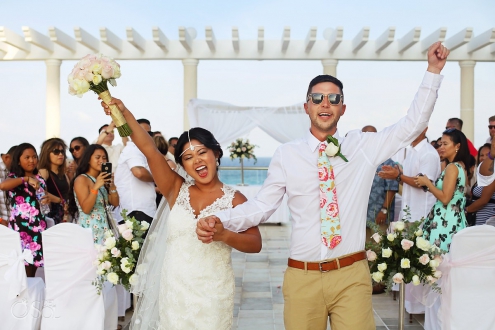 happy celebration, ceremony exit destination wedding Sandos Luxury Cancun rooftop