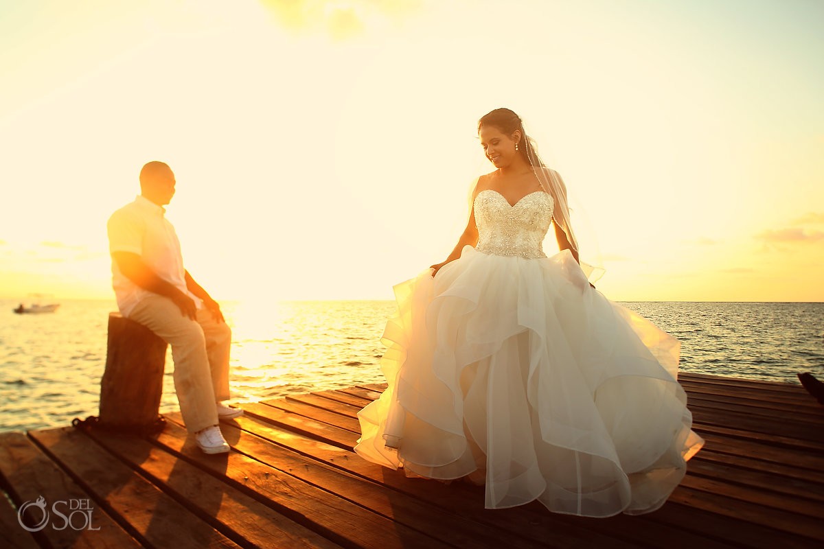 Sunrise wedding portrait trash the dress Eddy K Puerto Morellos pier, Mexico