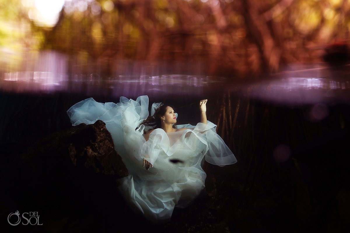 artistic underwater photograph bride wearing Eddy K wedding dress Riviera Maya Mexico