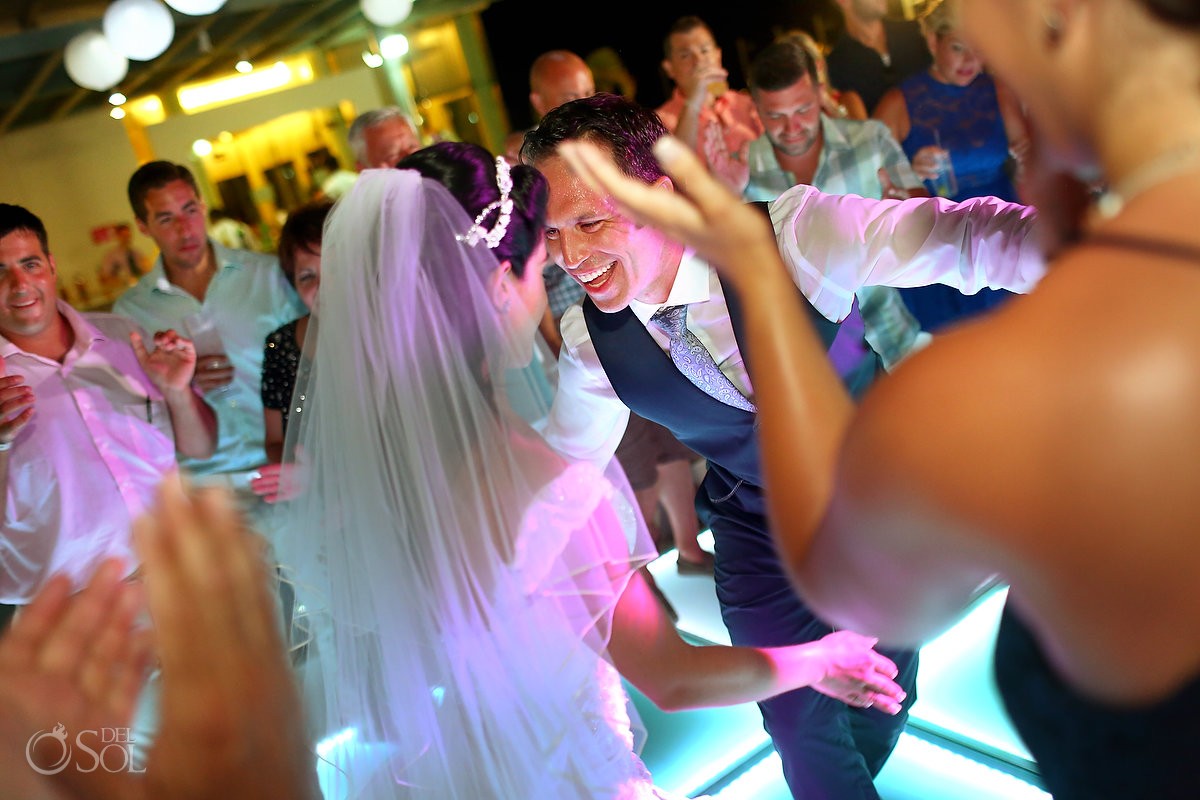 bride and groom dancing 4th July destination wedding reception Party Beach Palace Cancun Sky Terrace