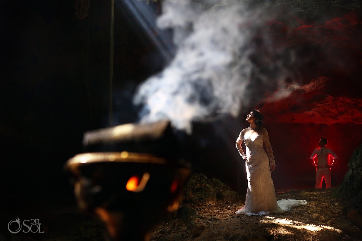 copal incense burning smoke wedding portrait Aktun-Chen dry cave trash the dress