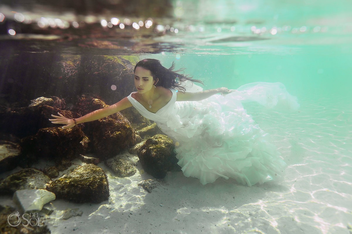 A bride brings her baby to her unique trash the dress