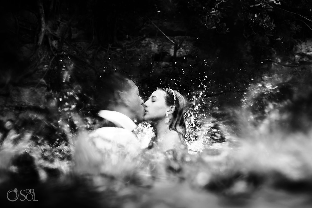 Best moment kiss, slpash of love, Cenote Riviera Maya Mexico