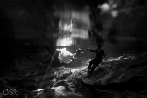 Black and white underwater portrait trash the dress cenote Aktun Chen, Mexico