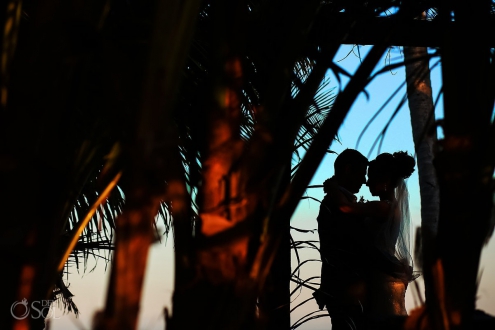 creative silhouette bride and groom beach portraits Blue Venado Beach Club Playa del Carmen Mexico.