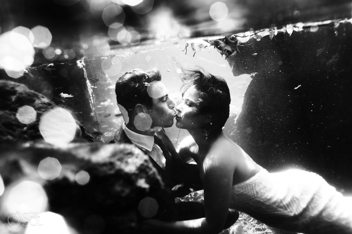 Underwater kiss trash the dress black and white photography Cenote Trash the Dress Riviera Maya Mexico