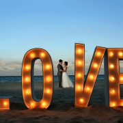 giant love sign wedding portrait destination wedding reception Grand Hyatt Playa del Carmen Mexico