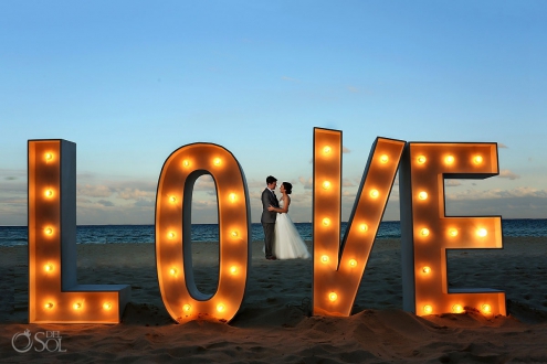 giant love sign wedding portrait destination wedding reception Grand Hyatt Playa del Carmen Mexico