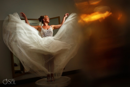 creative bride portrait throwing her dress Breathless Riviera Cancun Wedding Mexico