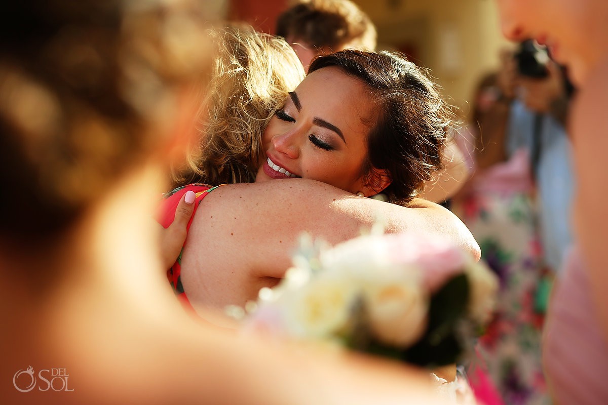 hugs and celebration after ceremony beach wedding Now Sapphire Riviera Cancun Mexico
