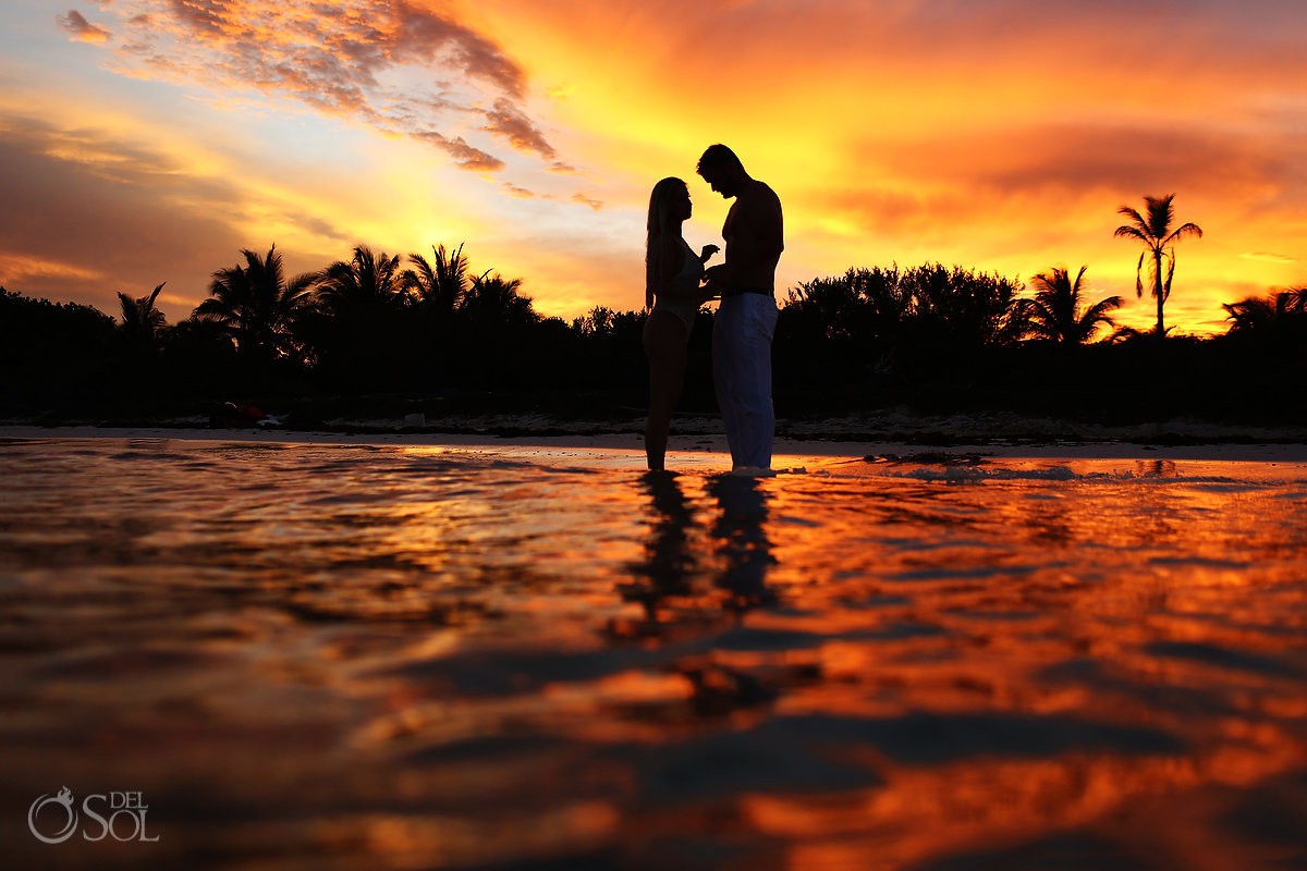 Amazing sunset silhouette couples photo dreams Tulum Riviera Maya Mexico