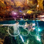 Bride and groom underwater vow renewal Cenote Riviera Maya Mexico