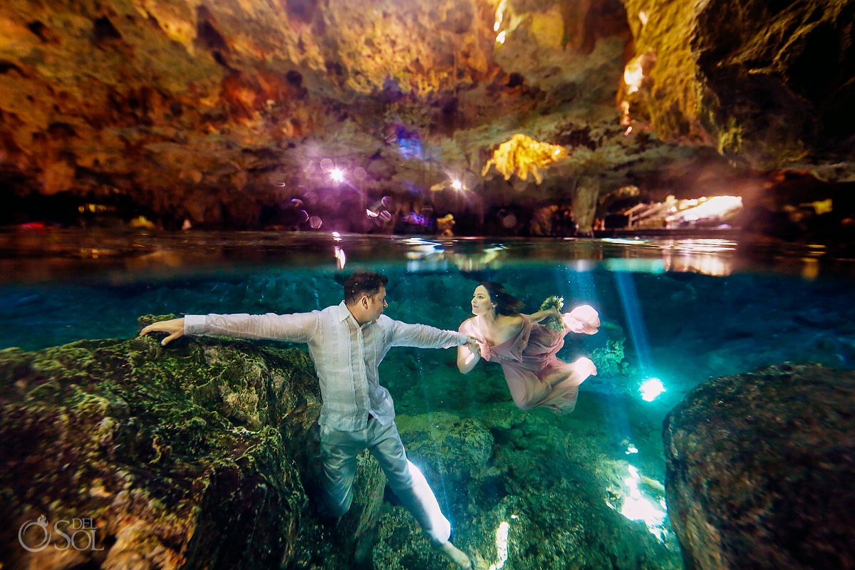 Bride and groom underwater vow renewal Cenote Riviera Maya Mexico