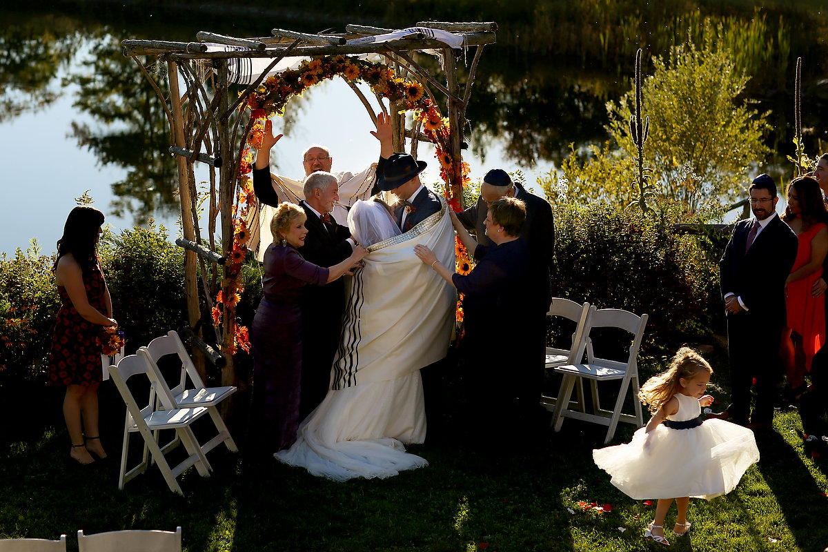 Jewish wedding ceremony Rabbi blessing flower girl dancing Bolton Valley Resort Vermont United States