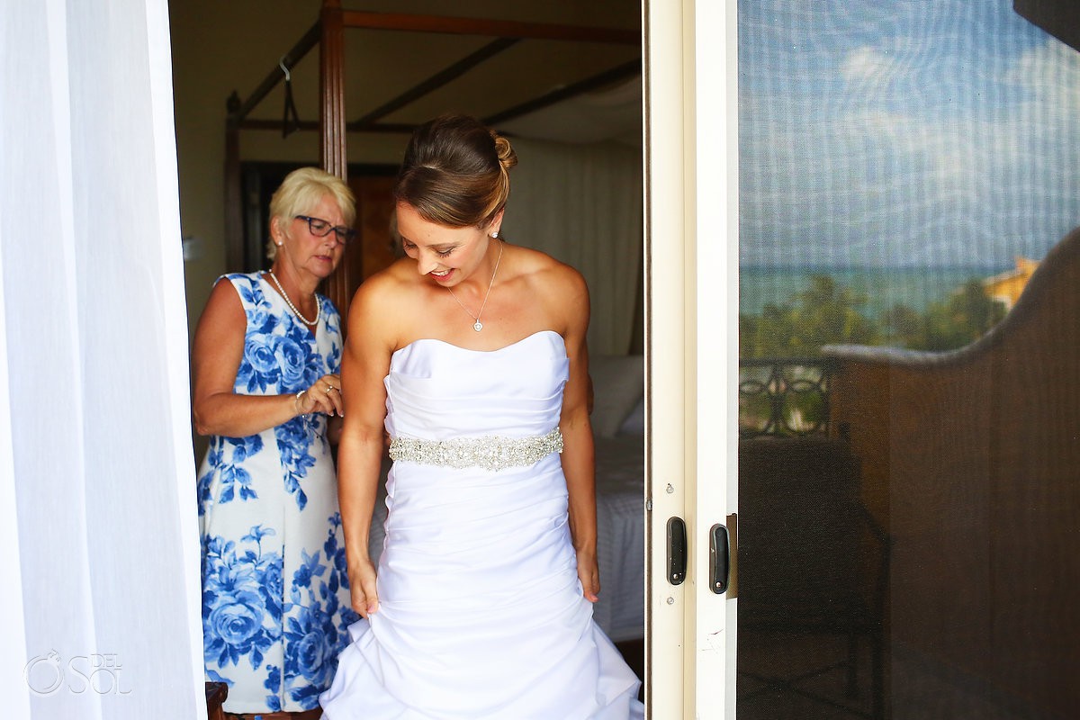 Bride getting ready mom helping Secrets Capri Riviera Cancun Playa del Carmen Mexico