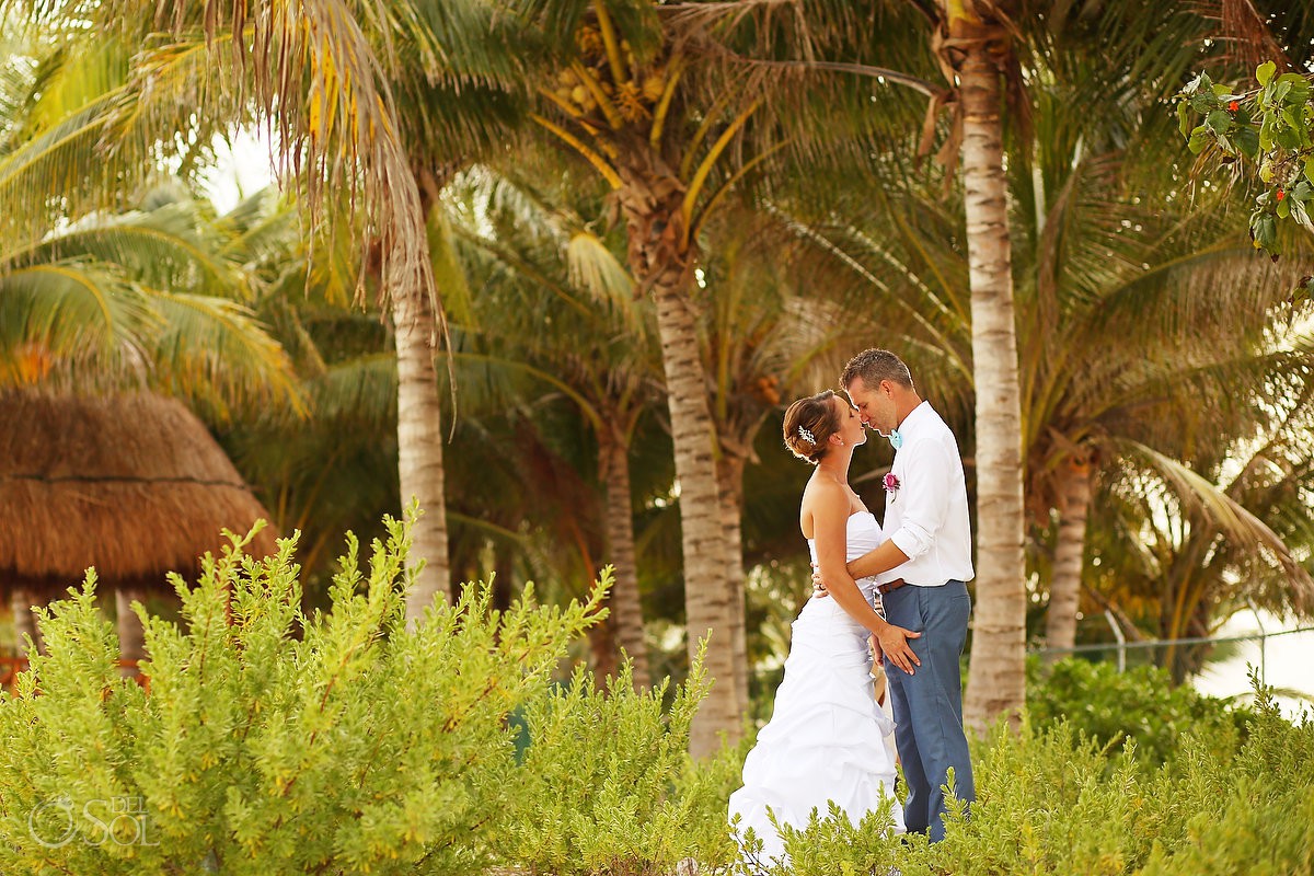 Palm trees love at beach bride and groom Secrets Capri Riviera Cancun Playa del Carmen Mexico