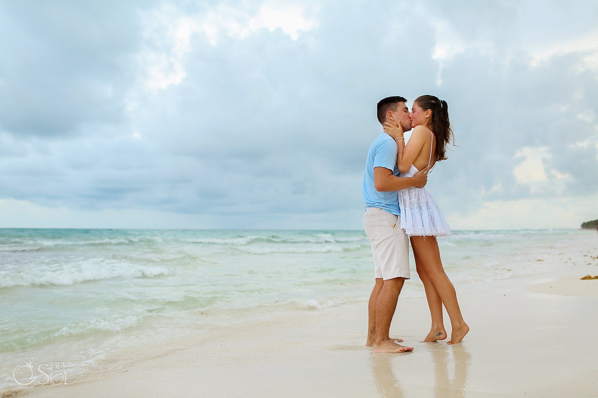 tulum beach engagement photos surprise proposal photography be tulum hotel tulum love just engaged happy couple bride groom beach destination bride kiss groom hug lovers kissing engagement ring hands she said yes