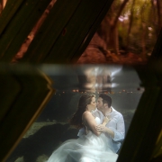 Love is better underwater bride and groom kiss Cenote Trash the Dress Riviera Maya Mexico