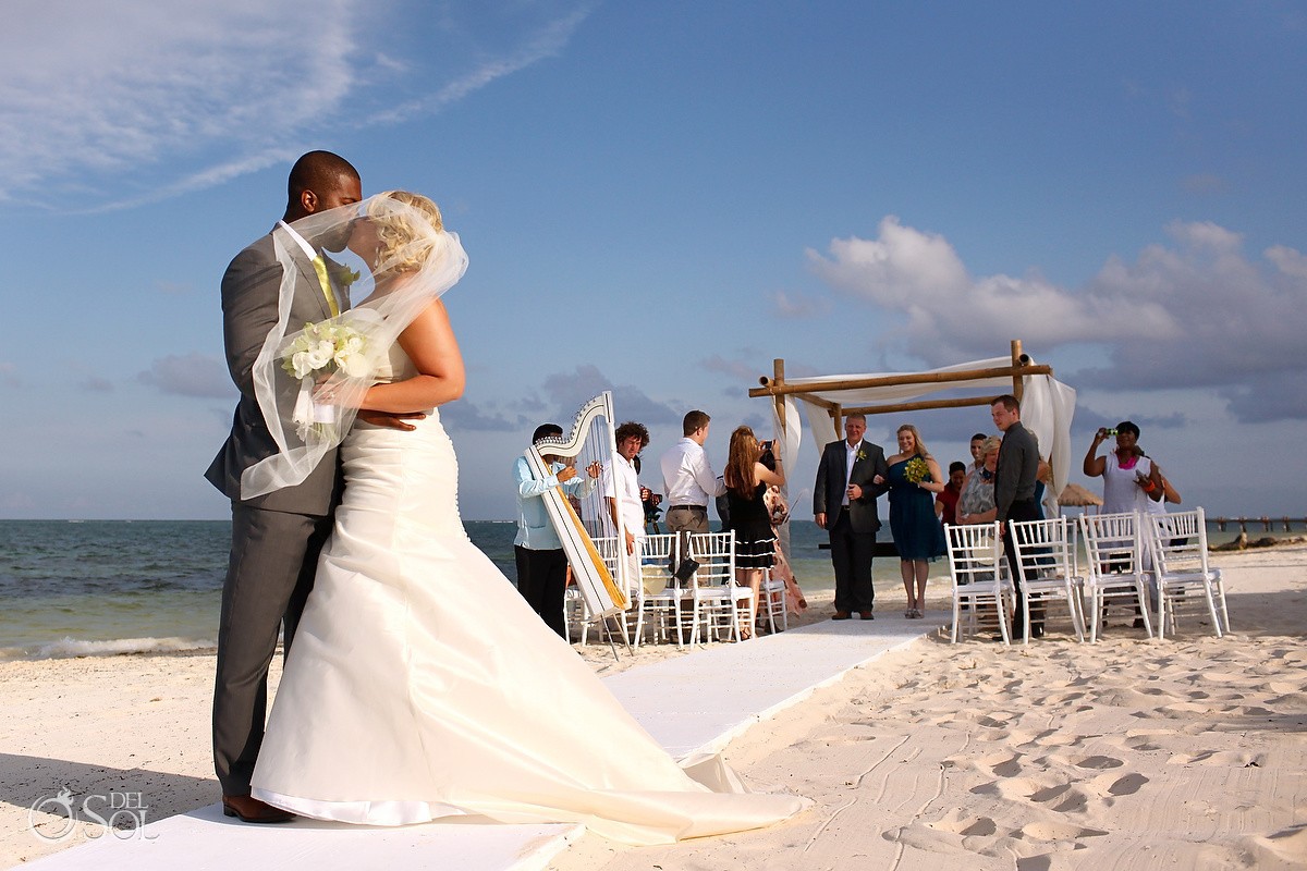 Zoetry Paraiso de la Bonita Wedding Photography beach kiss Riviera Maya Mexico Destination Weddings