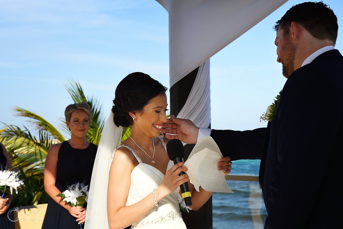 sweet ceremony moment groom touches bride's face destination wedding NOW Jade