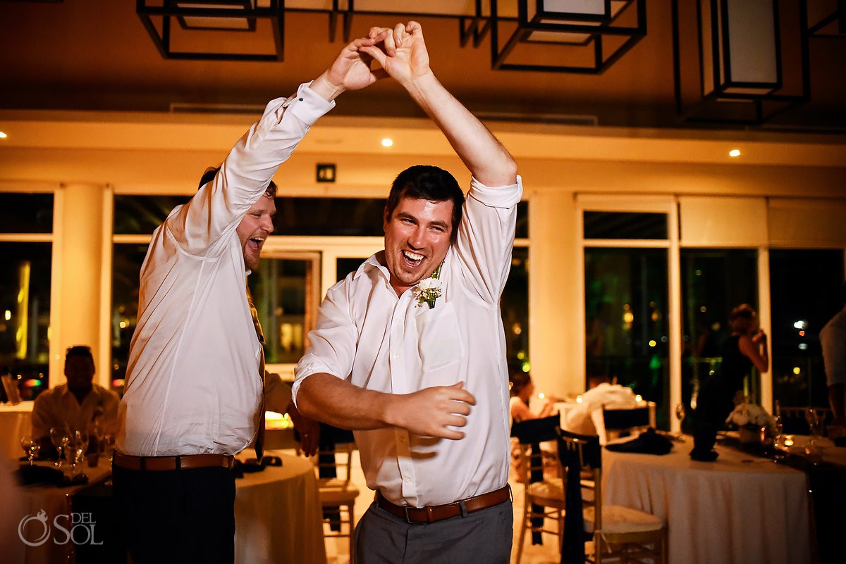 finny wedding reception photo groom and groomsman dancing