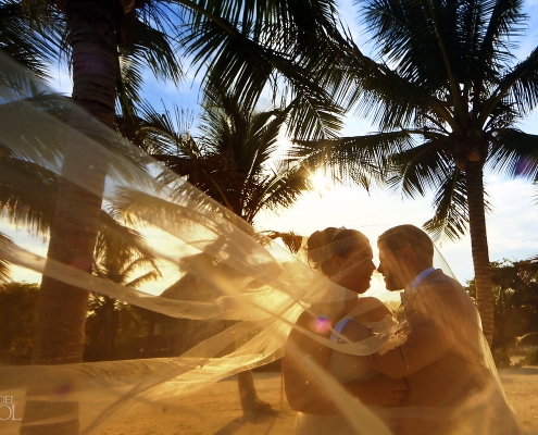 Sunset golden hour Akumal Bay Destination Wedding bride groom portrait
