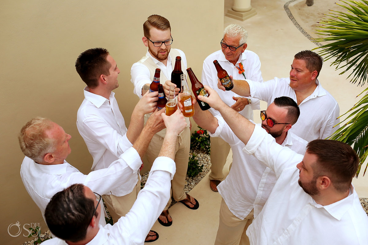 Tulum Boutique Villa Wedding groom groomsman drinking beer cheers Tankah