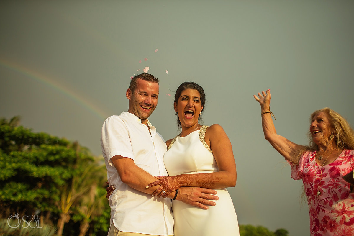 Groom and Bride sky Rainbow celebration