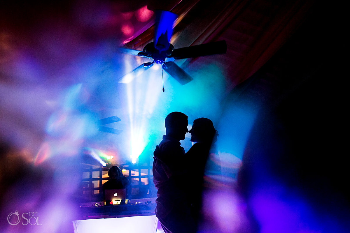 groom and bride silhouette at the wedding reception