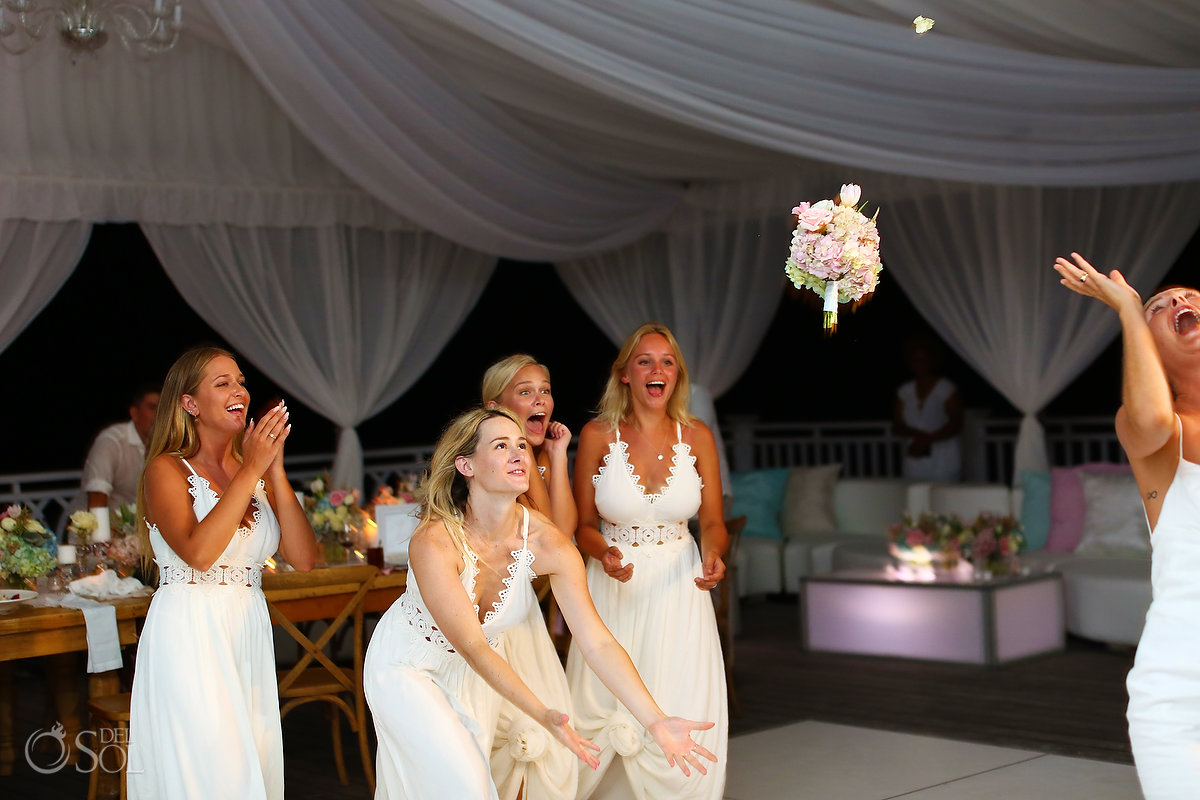 bouquet toss Four Seasons Ocean Club Wedding